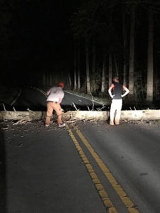 It was Penn College's Woodsman Team to the rescue – including Morrow (left) and Lauver – when a fallen hemlock impeded traffic along North Carolina's Pisgah Highway.
