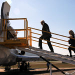 Marchioni and his wife, Barbara, "board" the Boeing 727 donated to the college by FedEx.