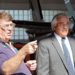 Thomas D. Inman, associate professor of aviation, takes Victor F. Marchioni through the hangar for a view of the college's enviable fleet of instructional aircraft.