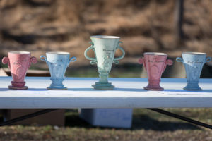 A lineup of gorgeous trophies crafted by Penn College ceramics instructors