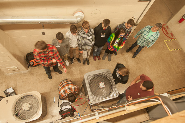In the HVAC lab, heat – as does the student photographer – rises to the upper level.