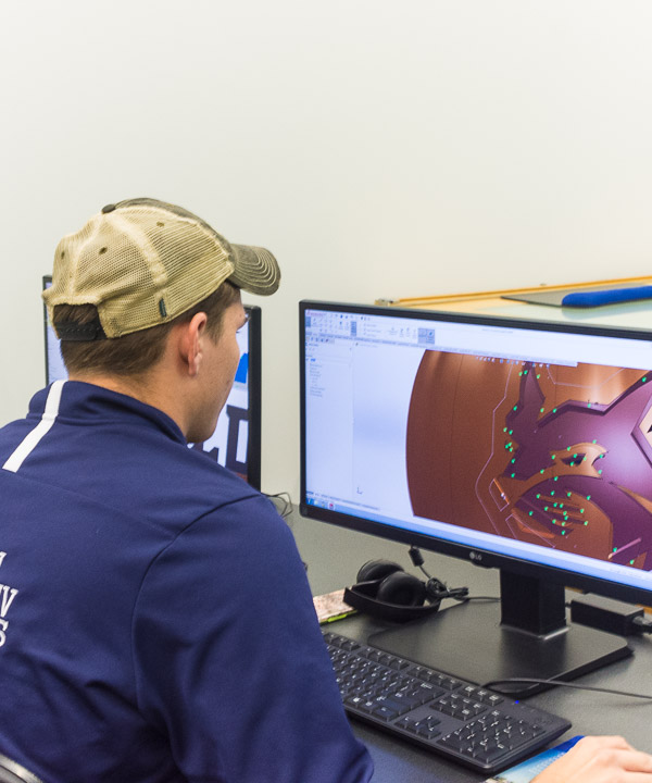 Bradley M. Haines, of Mifflinburg, wields virtual tools in seeing his design to the finish.