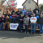 Phi Mu Delta brothers fill a float during Saturday's Veterans Day Parade ...