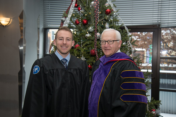 Student speaker and board chairman meet for a photo op prior to commencement.