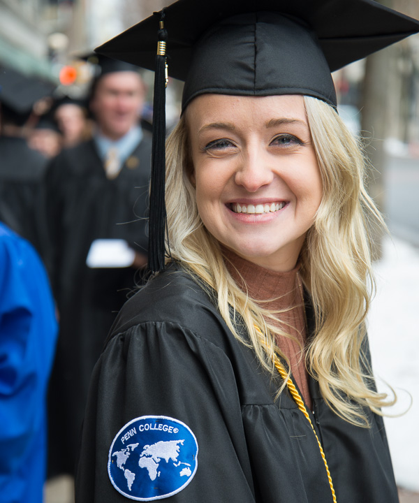 Among the graduates proudly sporting the international patch is Chelsea B. Eberly, dental hygiene: health policy and administration concentration, who traveled to Nicaragua. 