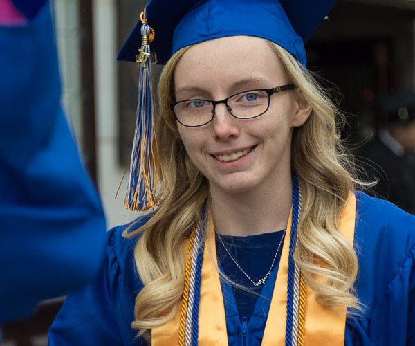 Melyce E. Kenyon, a culinary arts technology graduate from Canton, heads to the Arts Center.