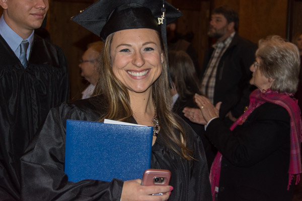 Kelly L. Liuzza, of Watsontown, flashes a smile that sums up her journey to a bachelor's degree in nursing.