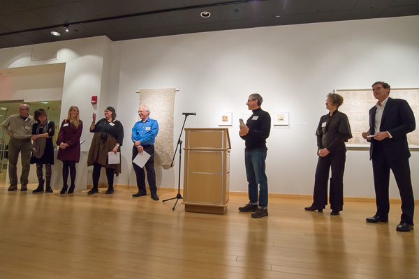 Artists in attendance line up to respond to visitors’ questions. From left: David Stabley, Deborah Stabley, Jamie Hannigan, Brenda Oelbaum, Gregg Silvis, Doug Beube, Carole Kunstadt and Chris Perry. 