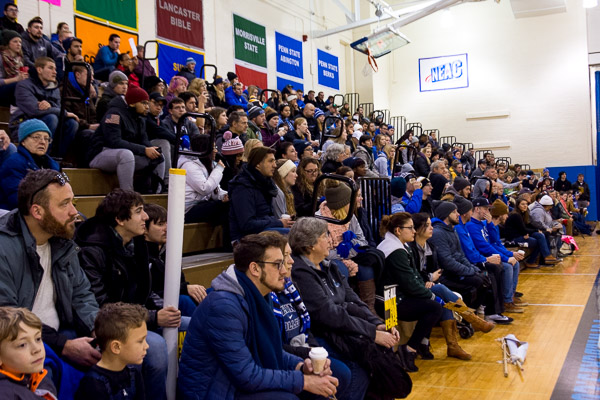 Those taking part in the day's activities rally in the college's Bardo Gymnasium.