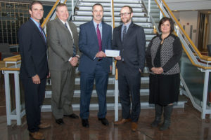 First National Bank recently provided a gift supporting two Penn College educational programs that serve high school students. From left are Don Breon, assistant vice president/treasury management; Daniel Hooper, vice president/ market manager; and Craig Muthler, senior vice president/commercial banking. From the college are Kyle Smith, executive director of the Penn College Foundation, and Tanya Berfield, manager of college transitions.