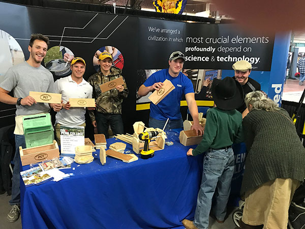 The School of Construction & Design Technologies turns woodwork into goodwill, helping Farm Show patrons assemble keepsake toolboxes adorned with the Penn College brand.