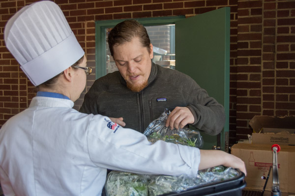Myers with Executive Chef Kurt Wewer of The Garlic Poet. Myers and Jacob W. Parobek took charge of preparing his recipes and assisting him on-stage as needed.