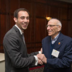Ryan Monteleone, an information assurance and cyber security student who thanked the crowd for their support of students, receives congratulations from William G. Knecht for a job well done – and a new job awaiting him at Pfizer Inc., near King of Prussia. Knecht backs the William G. and Marie E. Knecht Scholarship. 