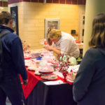 With steady hand and steely-eyed focus, Dining Services' Alyssa L. Fink, assistant baker, displays her cake-decorating skills.