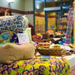 "Meditation cushions" colorfully pose a soft-sell for customers' contemplation.