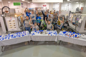 Members of Penn College’s Baja SAE team celebrate a recent donation of tools, valued at approximately $33,000, from Monster Tool Co. The 2,000-plus cutting tools will expand the students’ capability in building and modifying an off-road vehicle to compete against colleges from throughout the world in Society of Automotive Engineers competitions.