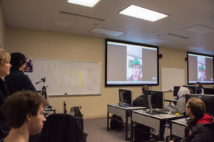 Also in the audience is club adviser Anita R. Wood (left), associate professor of computer information technology, whose courses include Game Programming and Advanced Topics in Computer Simulation and Gaming.
