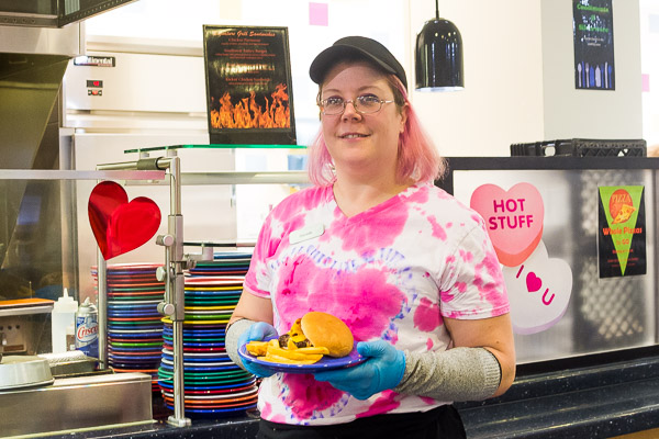 Among the friendly faces at the buffet table: Dining Services' Danielle L. Parker.