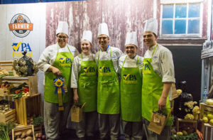 Penn College students (from left) Amaris T. Smith, of Williamsport, Bridget M. Callahan, of Pottsville, Jacob W. Parobek, of Seltzer, Brittany L. Mink, of Allentown; and Paul J. Herceg, of Chalfont, are among 11 Penn College student volunteers who helped to showcase recipes made from quality Pennsylvania ingredients at the 2018 Pennsylvania Farm Show.