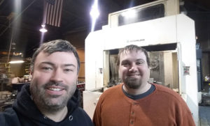 Former Penn College students Steven D. Belin (left) and Wayne B. Mitz are the founders/owners of BelMit Development in York Springs, a company that machined the billet aluminum gas tank shells on the motorcycle driven by Keanu Reeves in a Super Bowl commercial for Squarespace.