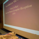 A pyramid of rolled-up tote bags awaits distribution to this year's notables.