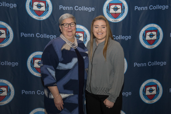 President Davie Jane Gilmour and Morgan B. Heritage, recipient of the Gilmour Scholarship, share a photo op.