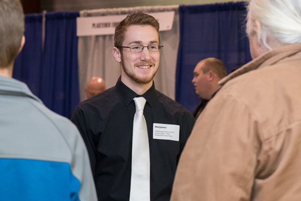 Conversing with fellow students and faculty before moving onto the employer stations is Benjamin A. Mowrer, of Manheim, enrolled in landscape/horticulture technology: plant production emphasis.   
