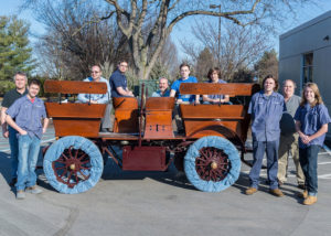 A 1908 Studebaker is surrounded by Penn College students and faculty instrumental in its functional fine-tuning for a prestigious show in Amelia Island, Fla. From left are Keith H. English, instructor of machine tool technology and automated manufacturing; student Alex M. Koser, of Mount Joy; Christopher H. Van Stavoren, assistant automotive professor; student Andrew B. Moyer, of Hughesville; Roy H. Klinger, automotive restoration instructor; students Benjamin T. Steimling, of Danville, Kevin S. Kyle, of Hatboro, and Michael R. Krukowski, of Fairfax Station, Va.; Eric K. Albert, associate professor of machine tool technology and automated manufacturing; and student Luke C. Miller, of Grasonville, Md. Steimling is an engineering design technology major; the other students are all enrolled in automotive restoration technology.