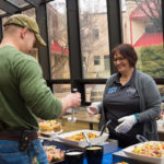  Deb E. Munro, a Dining Services assistant manager, helps fill the plate of John A. Gondy, of Glenmoore. Gondy majors in residential construction technology and management: architectural technology concentration.