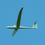 Faculty member Michael R. Robison soars above the Bald Eagle Ridge in a German-built glider.