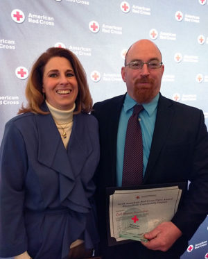 College Health Services Ellen K. Cero and Carl L. Shaner accept an American Red Cross award for their stewardship of campus blood drives. (Photo by Jennifer McLean, associate dean of student affairs)