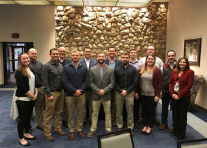 Scholarship recipients and members of Penn College's Construction Management Advisory Committee mark the occasion with a group photo. Back row (from left): Brandon Miller, area manager, Henkels & McCoy; Kevin M. Snoke, president/chief operating officer, Wagman Construction Inc.; James P. Craft, project manager, James Craft & Son Inc.; S. Curtis Wargo, project manager, Allan Myers; students Jacob R. Stouffer, of Chambersburg, and Calen B. Heeter, of Emlenton; and Matthew R. Sarver, CMAC secretary and project executive, Gilbane Building Co. Front row (from left): Student Lauren S. Herr, of Lititz; Brian J. Fish, general superintendent, Hensel Phelps Construction Co.; students Elias S. Brallier, of Hopewell, Nowell H. Covington, of Benton, and Derek S. Smith, of Port Matilda; Angie Moore, assistant project manager, Wickersham Construction; and Stephanie L. Schmidt, CMAC vice chair and president, Poole Anderson Construction. (Photo provided)