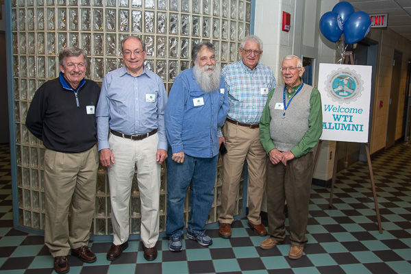 Drafting graduates from 1966-67 who had Chalmer Van Horn (far right) as their instructor reunite on the second floor of the Bush Campus Center. From left are Gareth Wick, Ron Good, Robert Kotarsky and Everett Brandt. Van Horn graduated from mechanical drafting in 1958. 