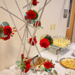 Unique floral arrangements, using sheet metal and rebar from the welding and aviation labs, were crafted by alumna Karen R. Ruhl.
