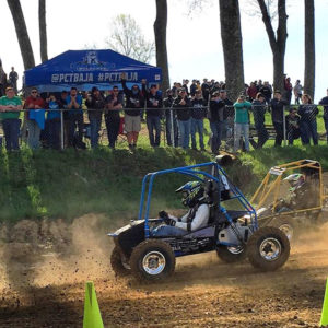 The Penn College No. 9 car elicits fan support at Baja SAE Maryland. 