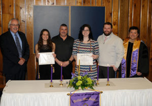 Principals in the Delta Mu Delta induction (from left) are Gregory, Weaver, Kopyscianski, Sonney, Walton and Nedegog.