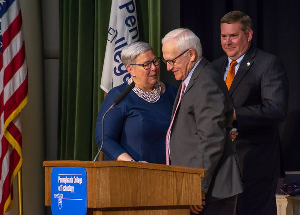 A genuine moment precedes Yaw's presentation of a 40-year pin to the president, who joined the Williamsport Area Community College faculty during the 1977-78 academic year.