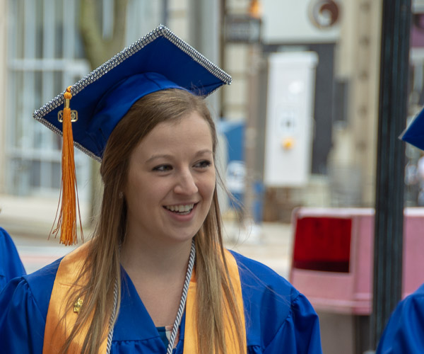 A bedazzled cap matches the forward-thinking glow of early childhood education graduate Jenelle N. Segur, of Canton.