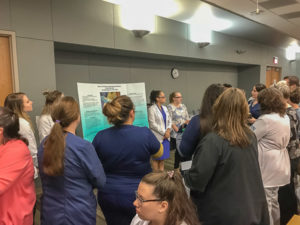Students present “Nurse Practices Regarding Medication Administration via Nasogastric Tube.” From left: Abigail J. Miller, Cheyenne M. Felix, Glendalis Guadarrama, and Britney E. Kister.