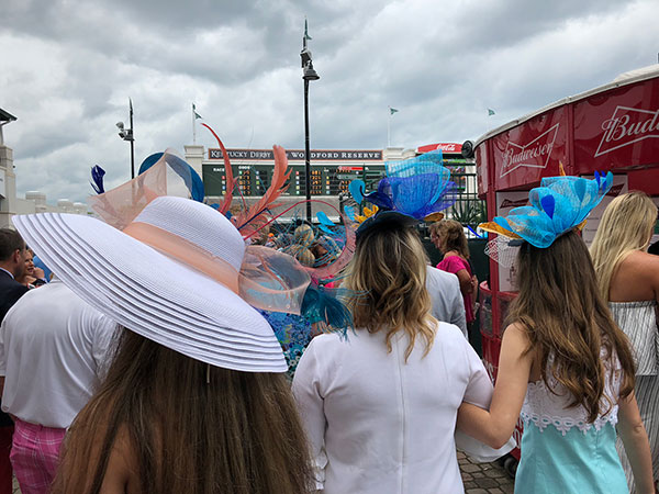 Hats featuring a canopy of colors always add style to Derby Week.