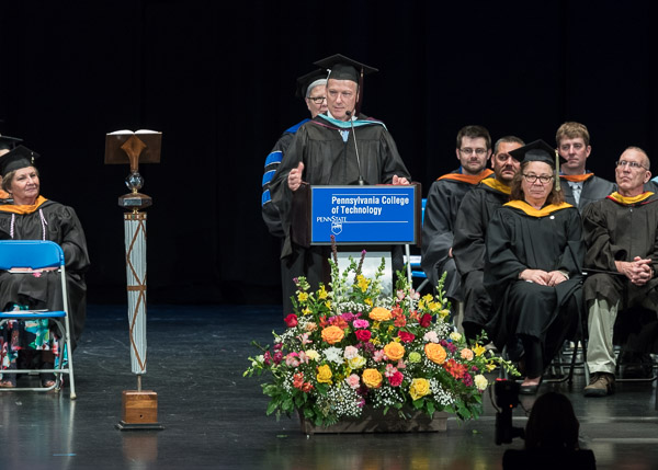 Faculty award recipient Thomas J. Mulfinger said he begins each day hoping to make a difference in his students' lives. With the unexpected presentation of an Excellence in Teaching certificate, he said he now knows how much of a difference they make in his.