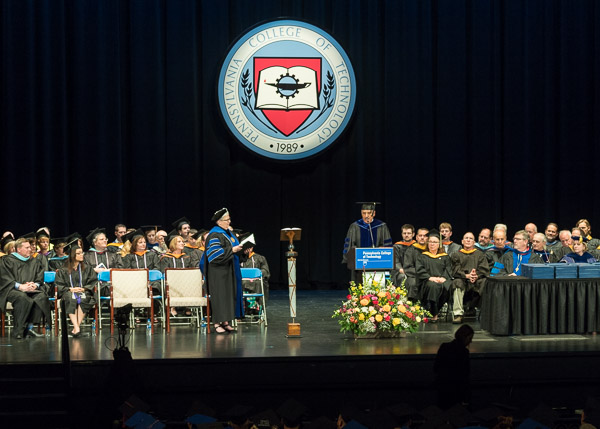 Blannie E. Bowen, a member of the college's board of directors, authorizes the conferral of degrees.