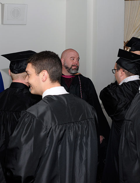 Construction management grads gather 'round Sheppard for some 11th-hour advice.