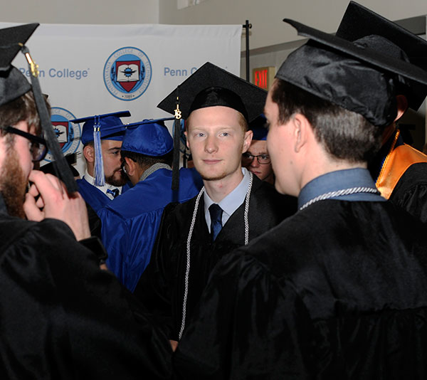 A picture of calm is Caleb E. Cartmell, outgoing president of the Student Government Association, who received  a degree in automotive technology management Saturday afternoon.