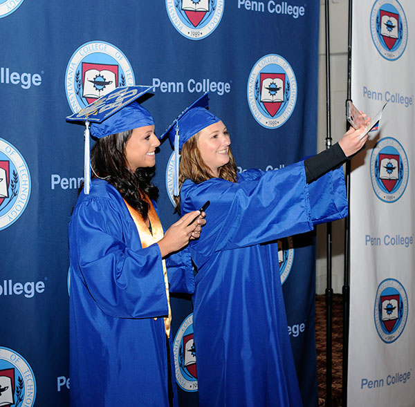 Dental hygiene grads Mikayla A. Krupa (left) and Jessica Zimmerman seize the day, selfie-style.