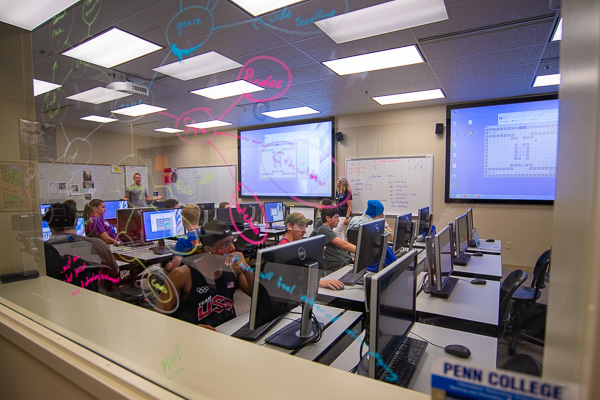 A college gaming lab serves as an inspiring space for the Designing a Digital Future Camp. 
