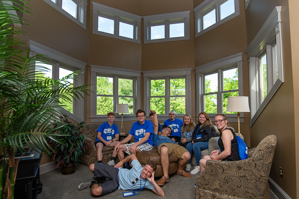Striking a pose in the Victorian House’s second-floor rotunda are Architecture Odyssey campers. 
