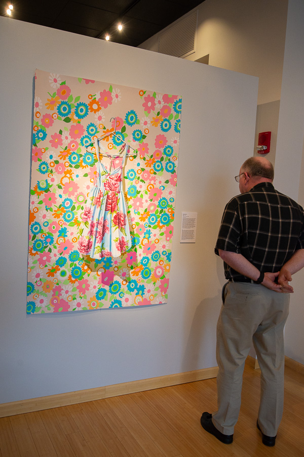A pop of color on the wall is offered by Margaret Murphy’s “Flower Dress,” a watercolor and acrylic on paper.