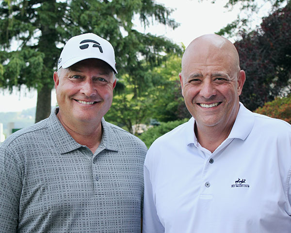 Dan Boever (left) and Chris Kowalewski, title sponsor representative