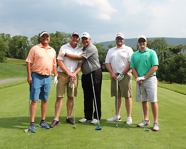 The Allison Crane and Rigging foursome includes Larry Allison (second from left), a Penn College scholarship donor and member of the Golf Classic Committee.